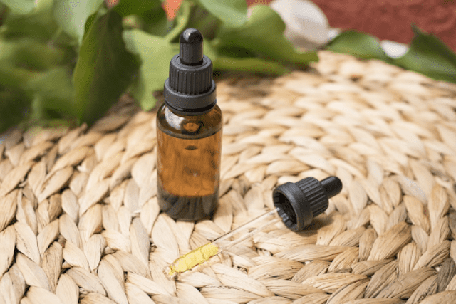 CBD oil in a bottle with dropper