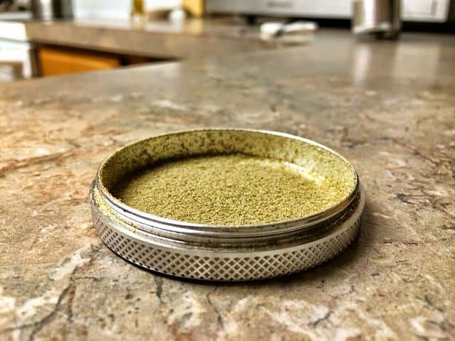 kief on a metal container