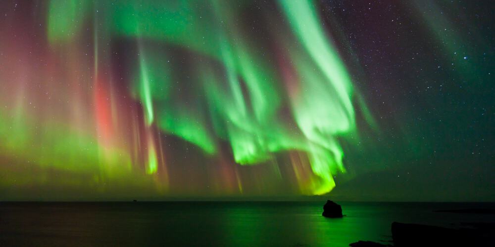 aurora colors over water