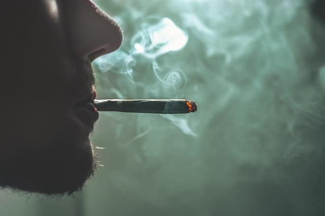 person smoking weed