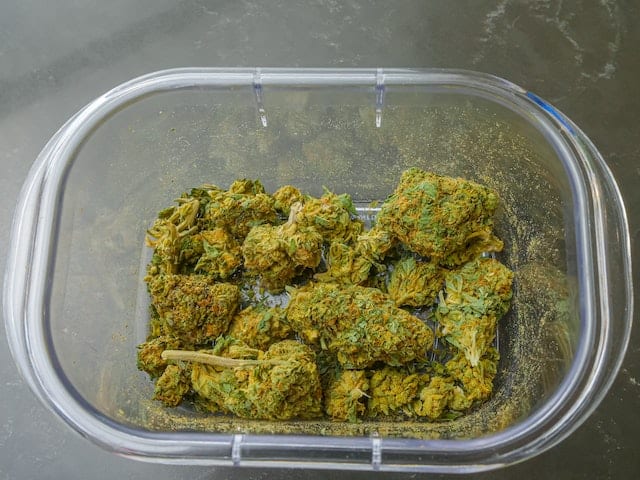 cannabis flowers on a glass tray