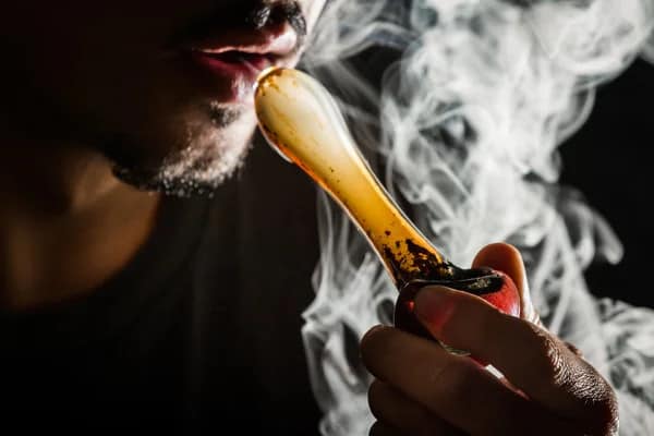 A guy heavy on weed - featured image