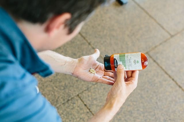 person about to take pain reliever